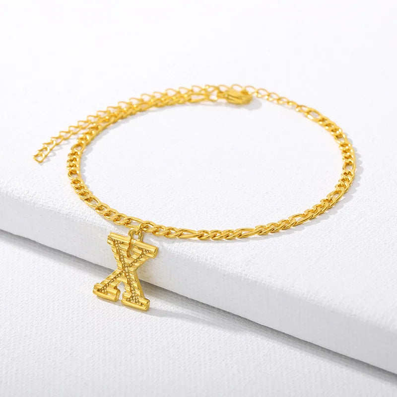 Shine bright with our Vintage 26 Initial Letter Gold-Plated Cuban Chain Anklet – perfect for adding a personal touch to your summer style! ✨🦵💖