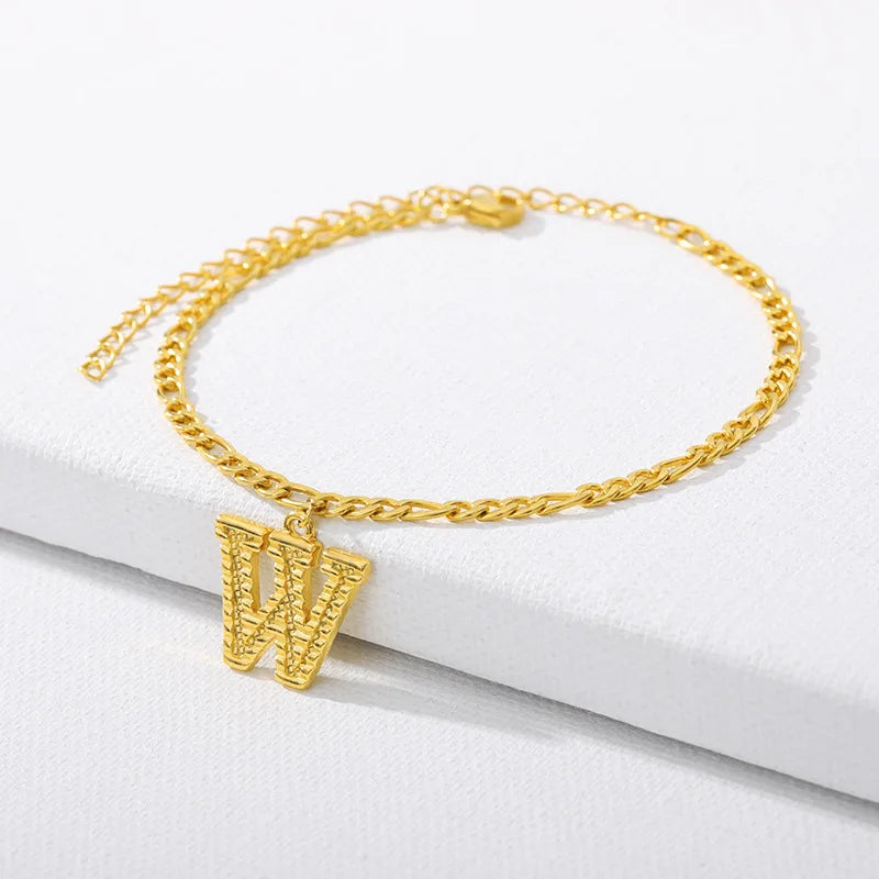 Shine bright with our Vintage 26 Initial Letter Gold-Plated Cuban Chain Anklet – perfect for adding a personal touch to your summer style! ✨🦵💖