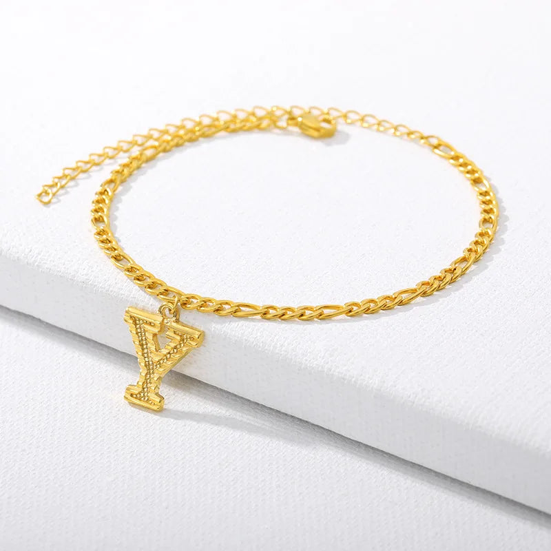 Shine bright with our Vintage 26 Initial Letter Gold-Plated Cuban Chain Anklet – perfect for adding a personal touch to your summer style! ✨🦵💖