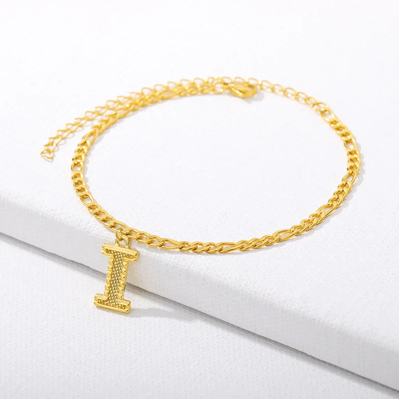 Shine bright with our Vintage 26 Initial Letter Gold-Plated Cuban Chain Anklet – perfect for adding a personal touch to your summer style! ✨🦵💖