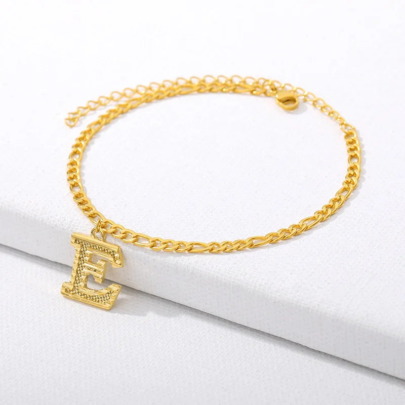 Shine bright with our Vintage 26 Initial Letter Gold-Plated Cuban Chain Anklet – perfect for adding a personal touch to your summer style! ✨🦵💖