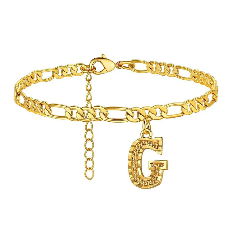 Shine bright with our Vintage 26 Initial Letter Gold-Plated Cuban Chain Anklet – perfect for adding a personal touch to your summer style! ✨🦵💖