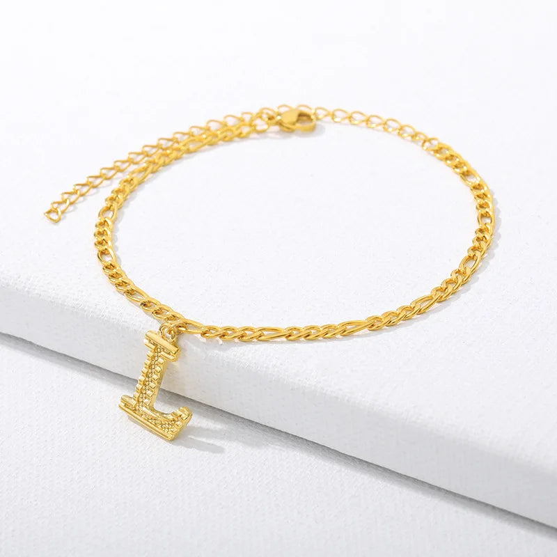 Shine bright with our Vintage 26 Initial Letter Gold-Plated Cuban Chain Anklet – perfect for adding a personal touch to your summer style! ✨🦵💖