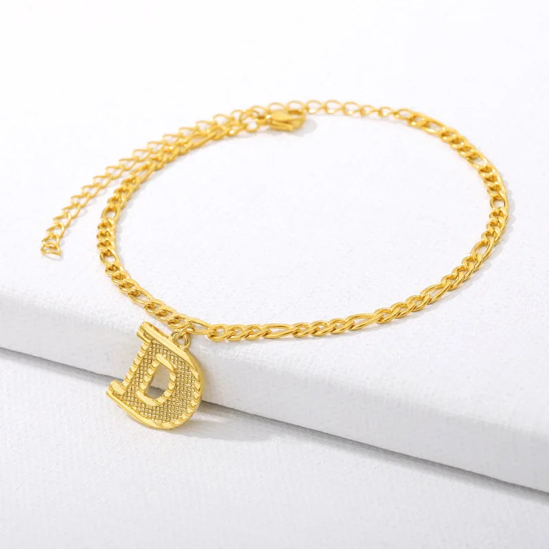 Shine bright with our Vintage 26 Initial Letter Gold-Plated Cuban Chain Anklet – perfect for adding a personal touch to your summer style! ✨🦵💖