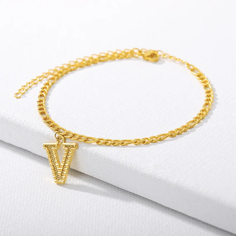 Shine bright with our Vintage 26 Initial Letter Gold-Plated Cuban Chain Anklet – perfect for adding a personal touch to your summer style! ✨🦵💖