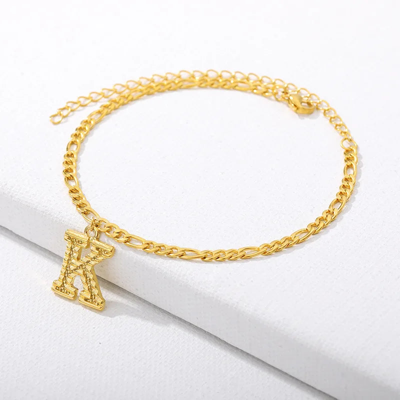 Shine bright with our Vintage 26 Initial Letter Gold-Plated Cuban Chain Anklet – perfect for adding a personal touch to your summer style! ✨🦵💖