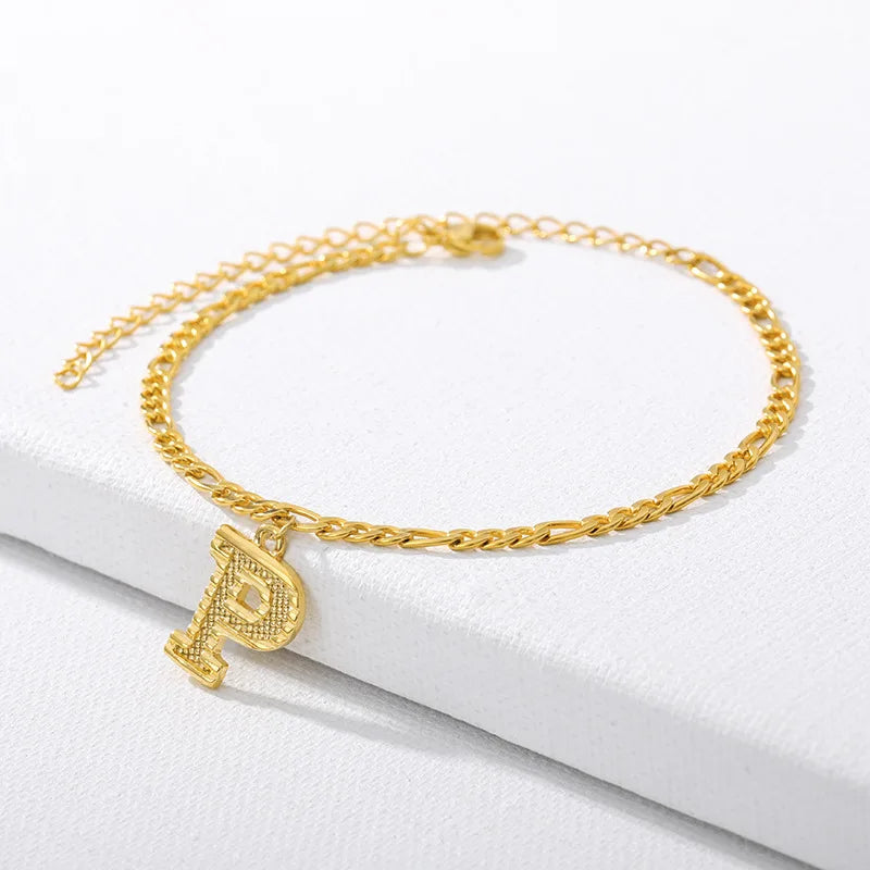 Shine bright with our Vintage 26 Initial Letter Gold-Plated Cuban Chain Anklet – perfect for adding a personal touch to your summer style! ✨🦵💖