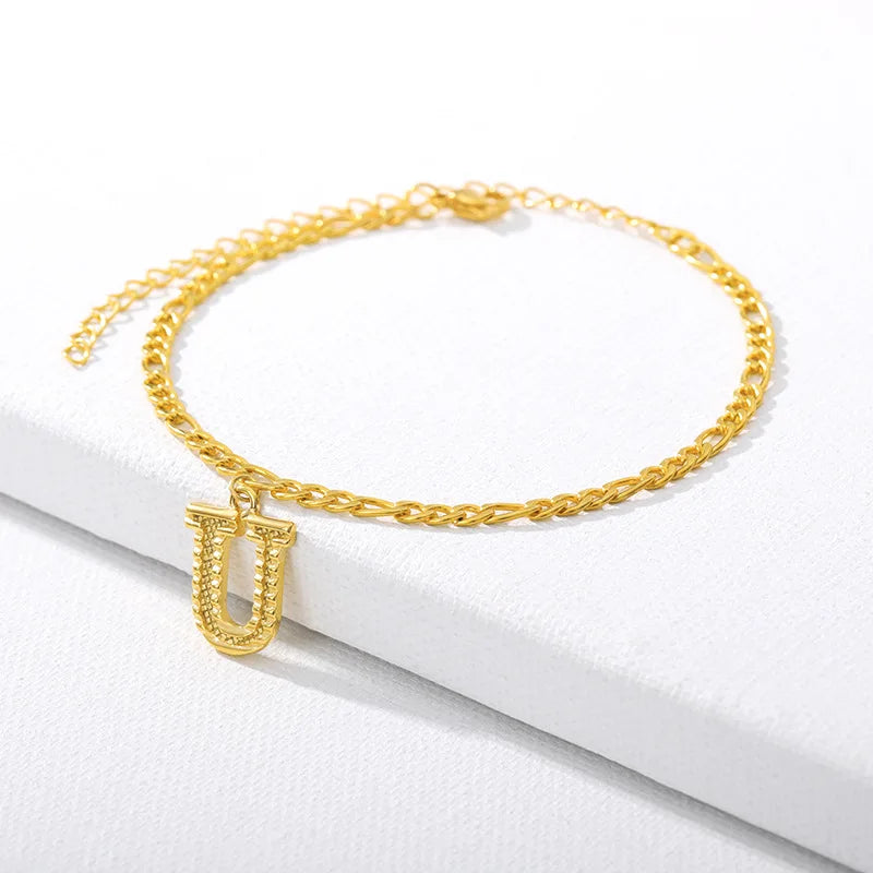 Shine bright with our Vintage 26 Initial Letter Gold-Plated Cuban Chain Anklet – perfect for adding a personal touch to your summer style! ✨🦵💖