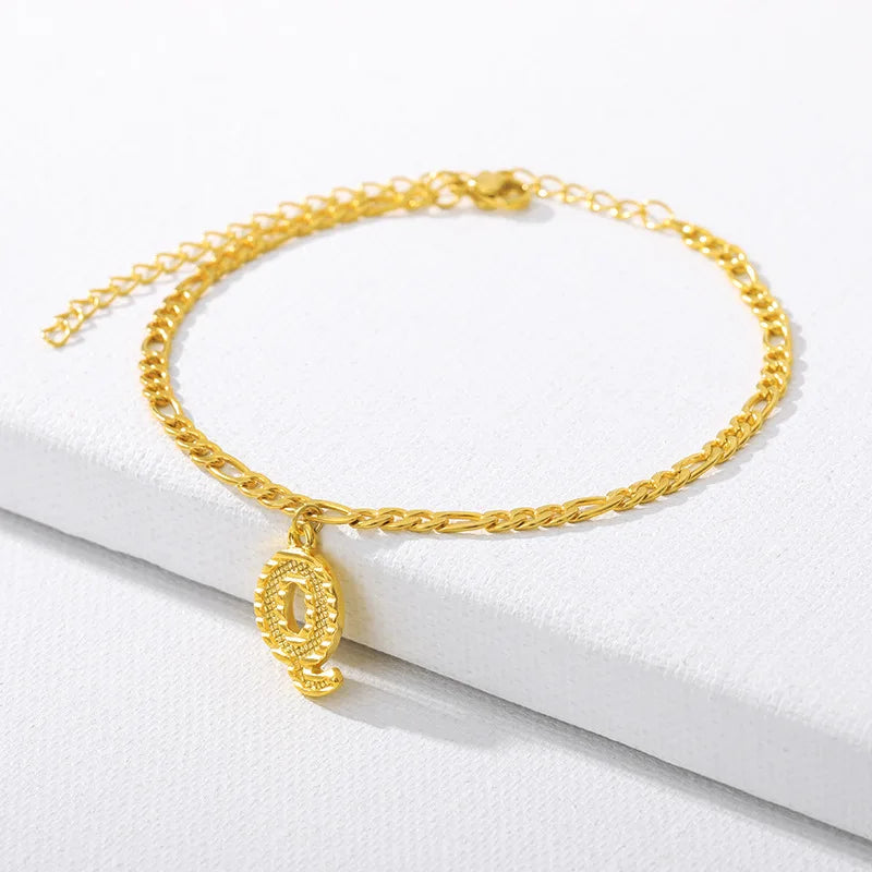 Shine bright with our Vintage 26 Initial Letter Gold-Plated Cuban Chain Anklet – perfect for adding a personal touch to your summer style! ✨🦵💖