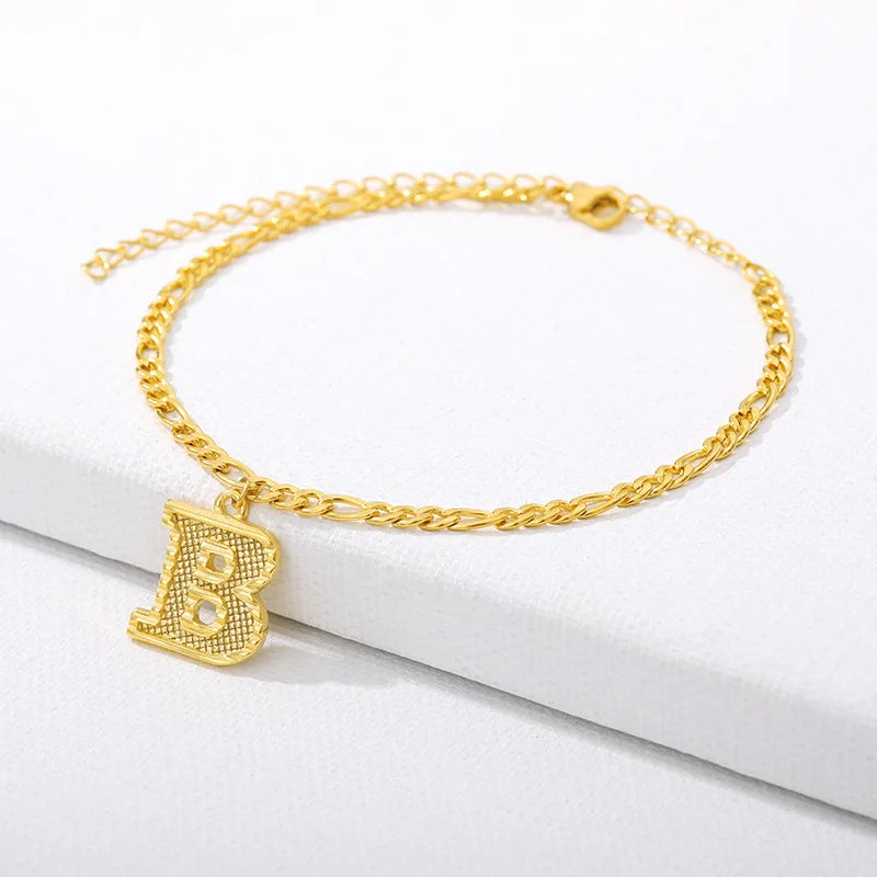 Shine bright with our Vintage 26 Initial Letter Gold-Plated Cuban Chain Anklet – perfect for adding a personal touch to your summer style! ✨🦵💖