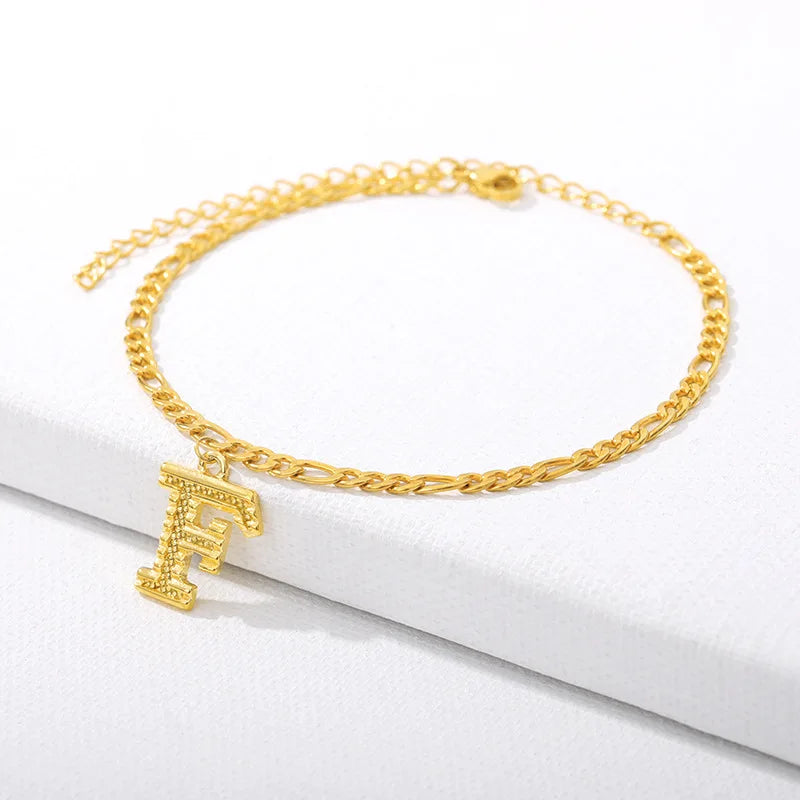 Shine bright with our Vintage 26 Initial Letter Gold-Plated Cuban Chain Anklet – perfect for adding a personal touch to your summer style! ✨🦵💖